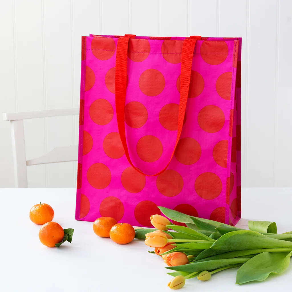 shopping bag - red on pink spotlight