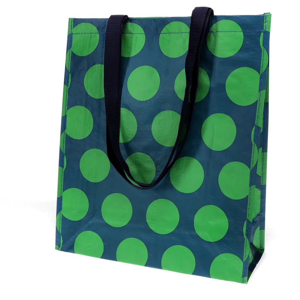 shopping bag - green on blue spotlight