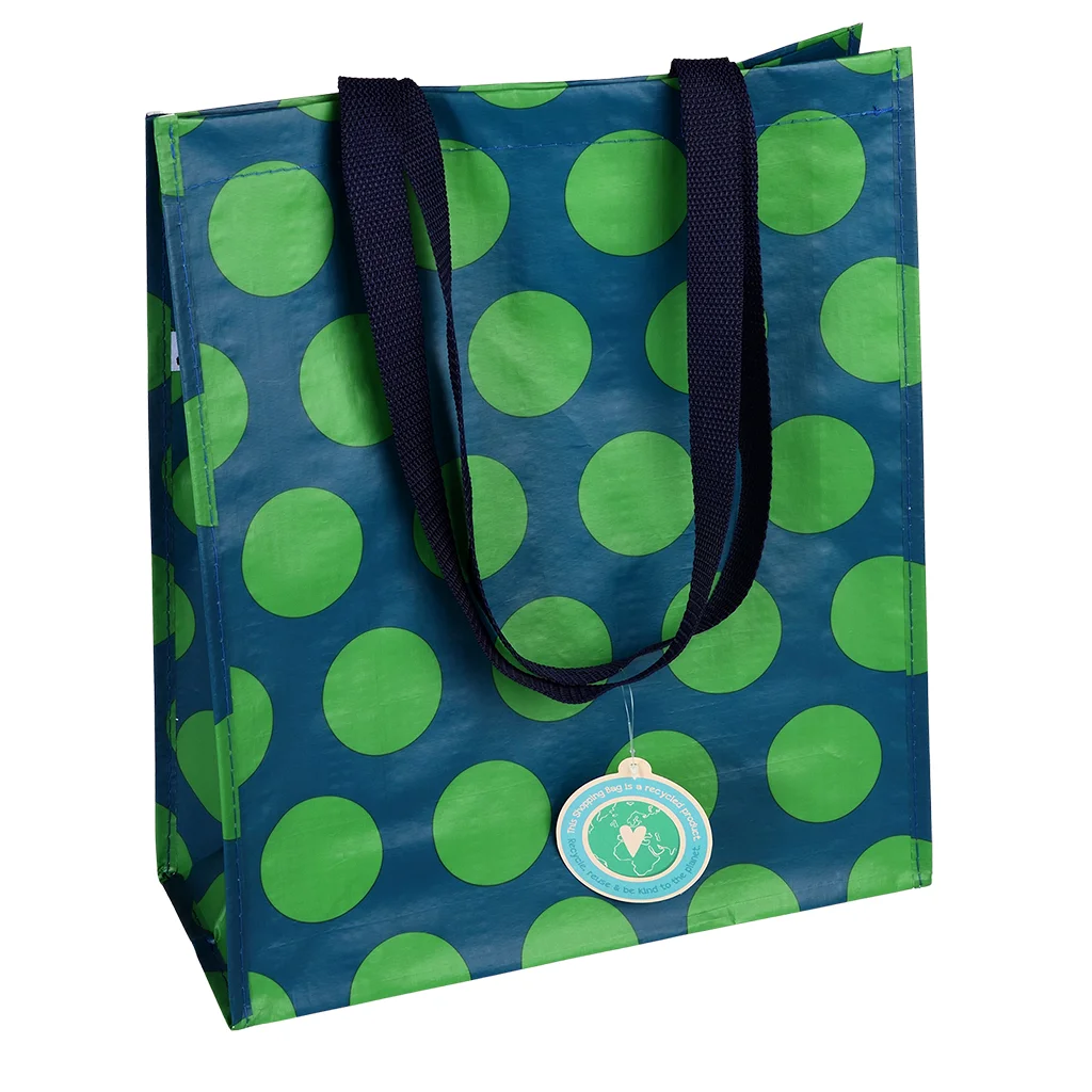 shopping bag - green on blue spotlight